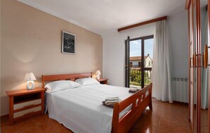 2 dormitorios, tabla de planchar con plancha, wifi gratis y ropa de cama