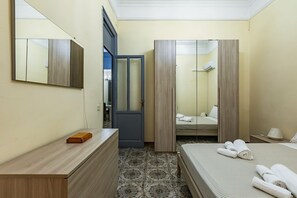 2 dormitorios, tabla de planchar con plancha, Internet y ropa de cama