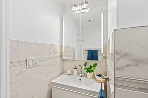 Hair dryer, towels, soap, shampoo