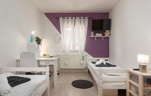 2 quartos, berço de viagem, Wi-Fi de cortesia, roupa de cama
