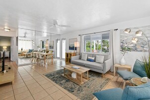 Two-bedroom suite | Living area | 35-inch flat-screen TV with cable channels, DVD player