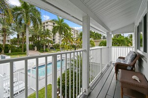 Outdoor pool, open 7:00 AM to 8:00 PM, pool umbrellas, sun loungers