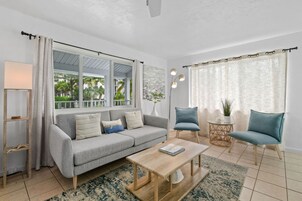 Two-bedroom suite | Living area | 35-inch flat-screen TV with cable channels, DVD player