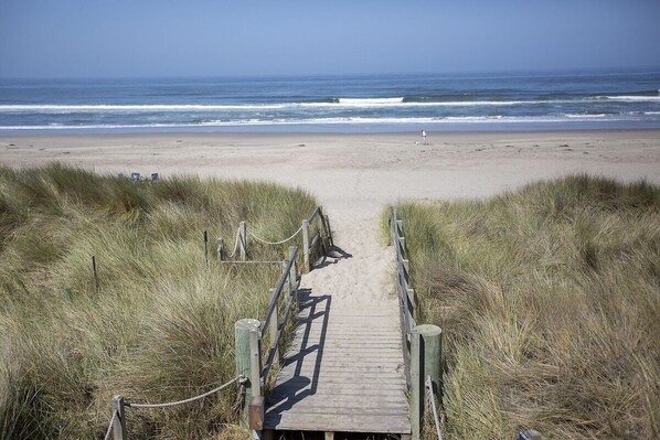 On the beach, sun loungers, beach towels