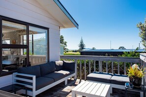 Property grounds - Brighton family bach - sea views, close to beach, park & shops, pet friendly! (Waihi Beach)