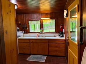 Fridge, microwave, oven, stovetop - Camp Garcon - Historic Great Camp in Raquette Lake (Raquette Lake)