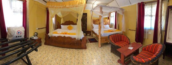 Economy Twin Room | Desk, laptop workspace, iron/ironing board, bed sheets