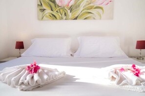 Ferros/tábuas de passar roupa, acesso à internet, roupa de cama
