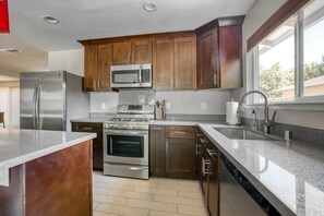 Fridge, microwave, oven, stovetop - Airy San Jose 4BR w/ Garage, Backyard + Patio, nr Tech, by Blueground (South Bay)