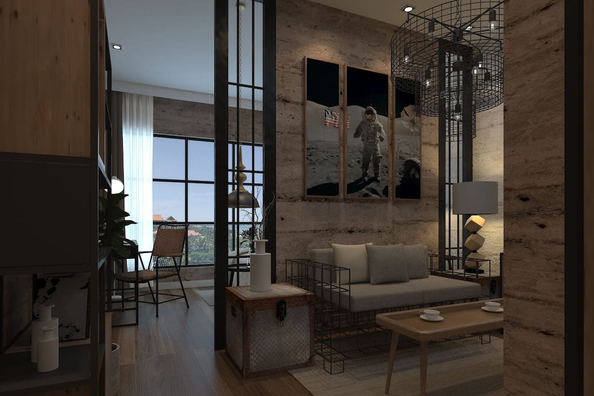 A modern living room with a sofa, coffee table, and a large window.