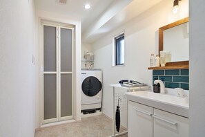 Combined shower/bathtub, free toiletries, hair dryer, bathrobes