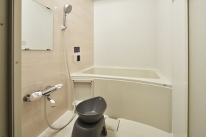 A bathroom with a bathtub, a shower, and a toilet. - B/C APARTMENT Asakusa Hanazono Dori Hotel with Rental Car and Sauna (Taito-ku)