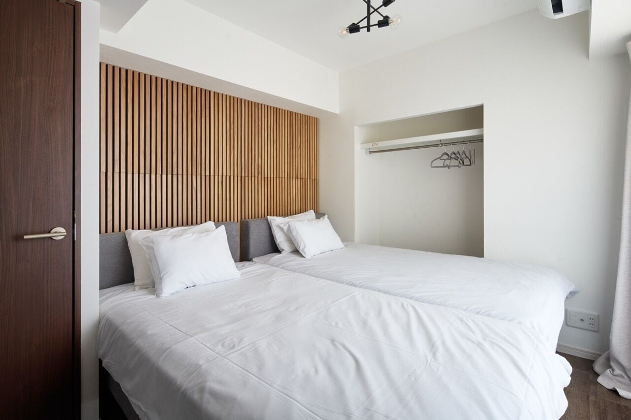 Desk, laptop workspace, blackout drapes, soundproofing