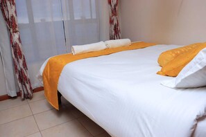1 bedroom, free WiFi, bed sheets - Cozy studio apartment, 15 mins from JKIA (Nairobi)