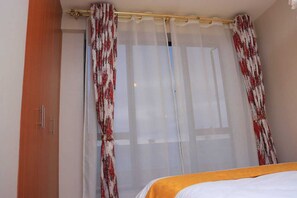 1 bedroom, free WiFi, bed sheets - Cozy studio apartment, 15 mins from JKIA (Nairobi)