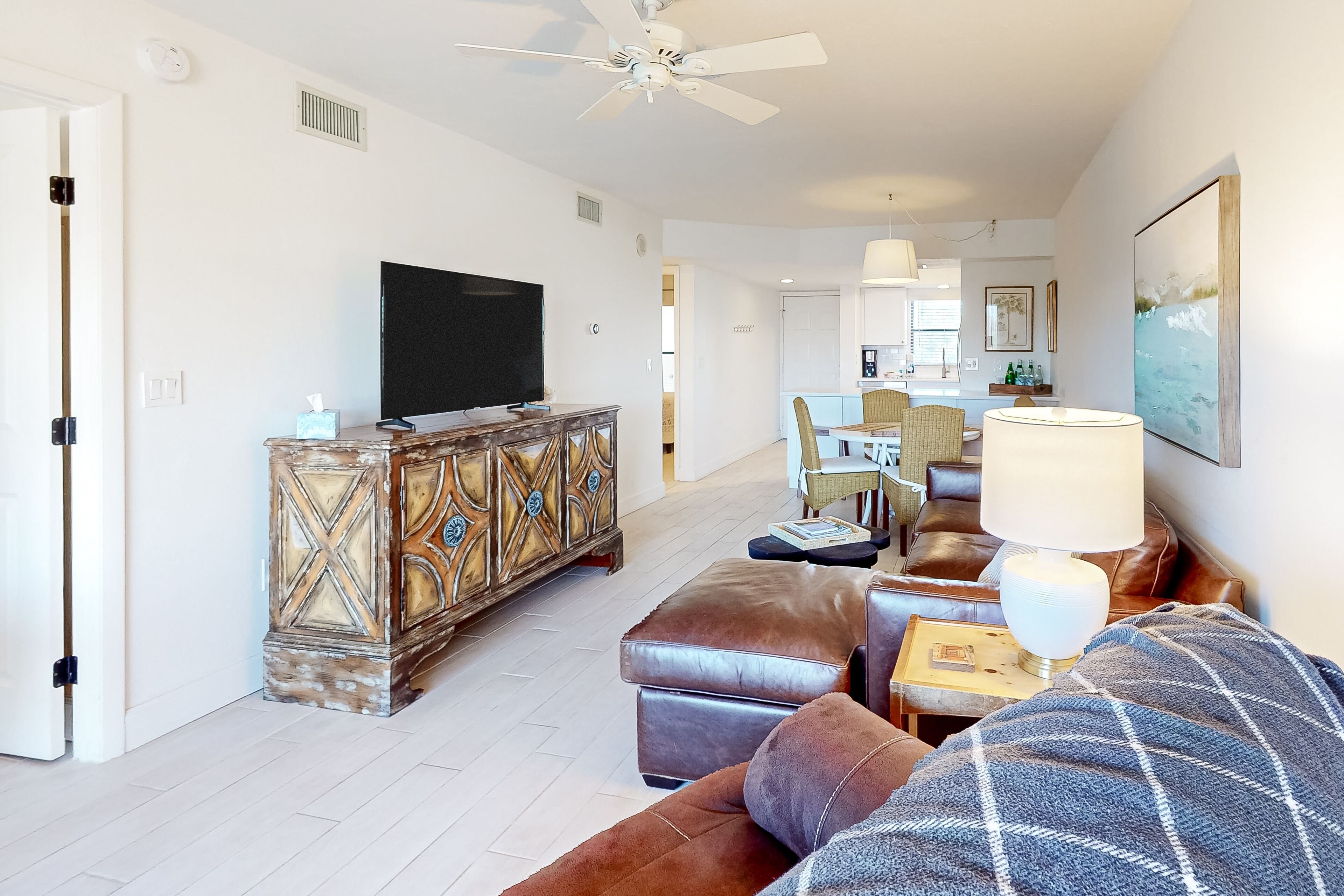 3rd-floor condo with screened balcony & on-site pool/tennis - walk to beach