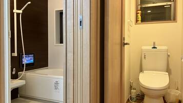 Hair dryer, bidet, towels, soap