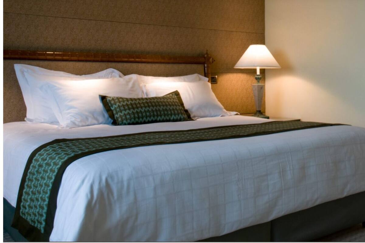 Panoramic Bungalow, Balcony, Mountain View | Desk, bed sheets