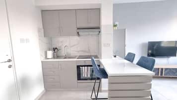 Microwave, stovetop, coffee/tea maker, cookware/dishes/utensils