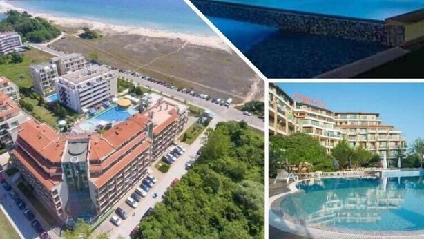A hotel with multiple buildings, a swimming pool, and a beach view. - PRESTIGE CITY2  (Primorsko)
