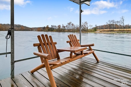 Terrace/patio. Riverfront Relaxation