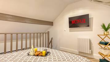 1 slaapkamer, een strijkplank/strijkijzer, wifi, beddengoed