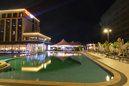 Outdoor pool, open 9:00 AM to 6:00 PM, pool umbrellas, sun loungers. Argyle Grand Hotel Nairobi Airport