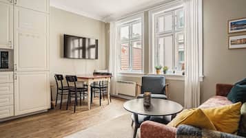 TV, fireplace, books, offices