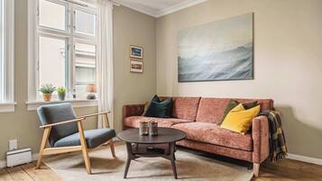 TV, fireplace, books, offices