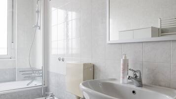 Bidet, towels, soap, shampoo