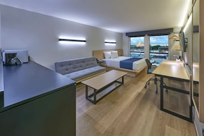Quarto superior, 1 cama King e sofá-cama, para não fumantes | Escrivaninha, cortinas blackout, quartos à prova de som