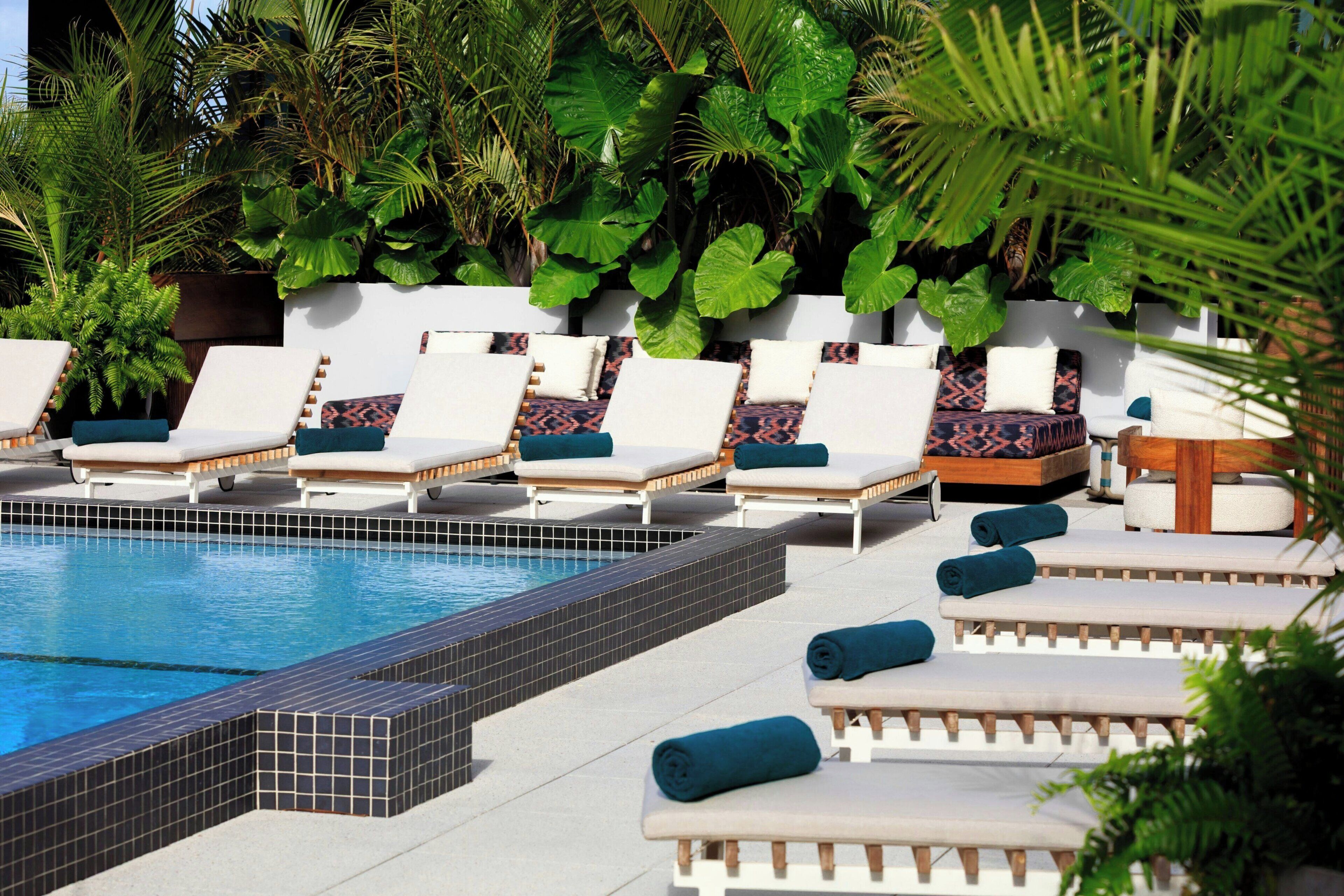 Outdoor pool, open 9:00 AM to 8:00 PM, free cabanas, pool umbrellas