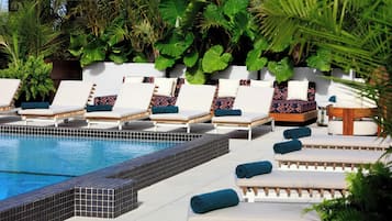 Outdoor pool, open 9:00 AM to 8:00 PM, free cabanas, pool umbrellas