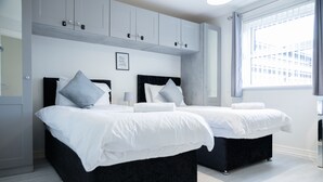 2 habitaciones, tabla de planchar con plancha y wifi gratis 