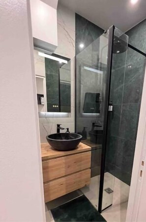 Hair dryer, towels, soap, shampoo