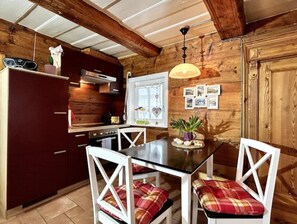Fridge, stovetop, dishwasher, coffee/tea maker