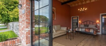 19th century restored Irish stable by the lake