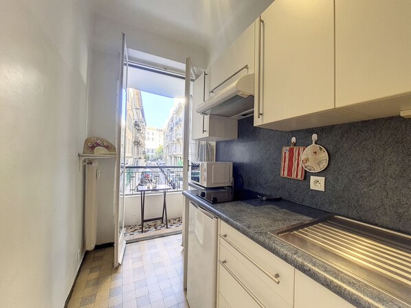 Fridge, microwave, coffee/tea maker, electric kettle