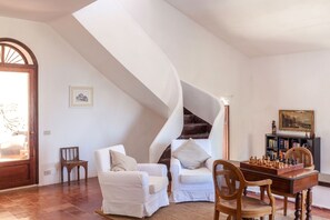 Villa | Living area | 35-inch flat-screen TV with digital channels