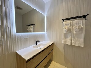 Hair dryer, towels, soap, shampoo