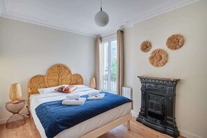 1 dormitorio, tabla de planchar con plancha, wifi gratis y ropa de cama