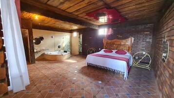 Habitación Deluxe | Caja de seguridad en la habitación, wifi gratis y ropa de cama