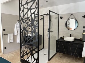 Shower, hair dryer, towels, soap