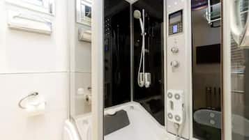 Apartment | Bathroom | Combined shower/bathtub, deep-soaking bathtub, hair dryer, towels