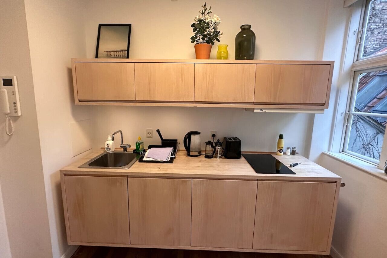 Fridge, coffee/tea maker, cookware/dishes/utensils