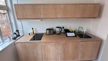 Microwave, toaster, cookware/dishes/utensils