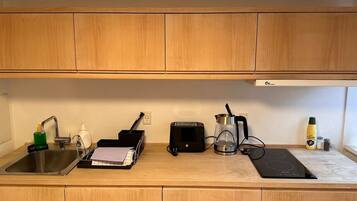 Fridge, microwave, toaster, cookware/dishes/utensils