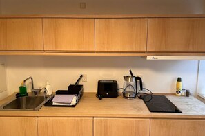 Fridge, microwave, toaster, cookware/dishes/utensils