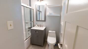 Hair dryer, towels, soap, shampoo