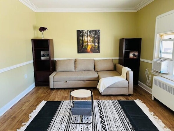 Living area - CLEAN + Central + Momo Apartment
(St. Catharines)